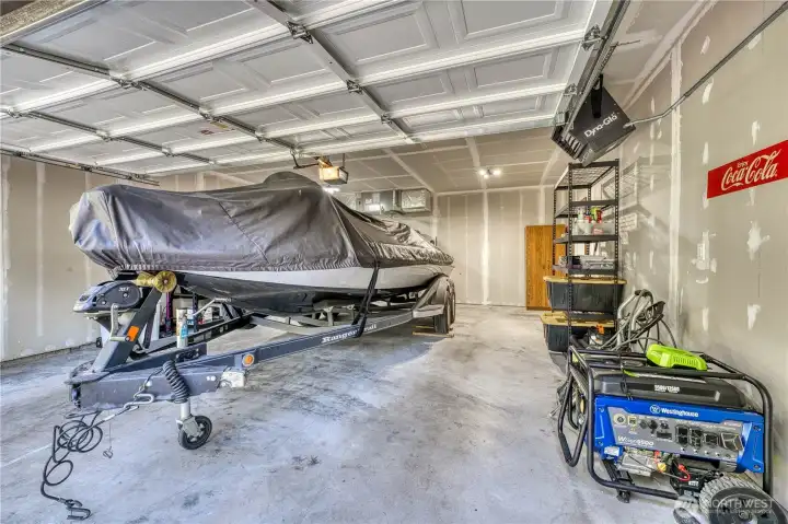 Garage has a mounted heat source and the generator stays with the home as well.