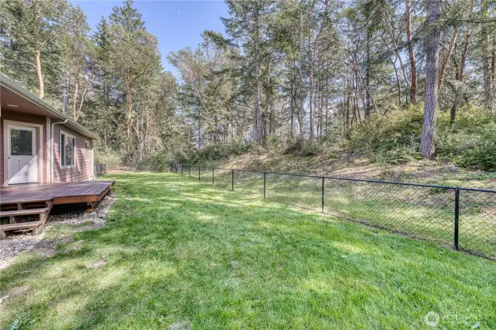 The property line extends a good deal beyond the fencing giving options and versatility.