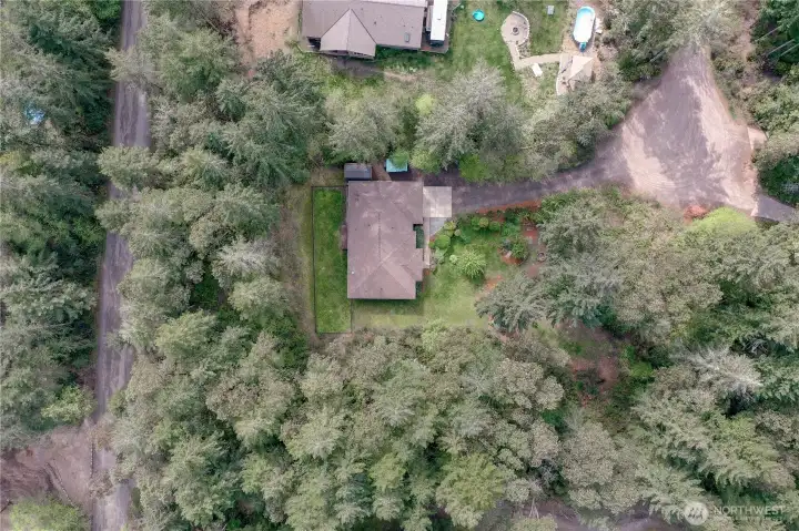 Tucked in privately on 1.24 acres.  Enjoy the privacy or create more usable space?  You decide!