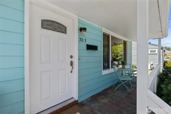 The front porch was recently cleaned and is ready for your touches.