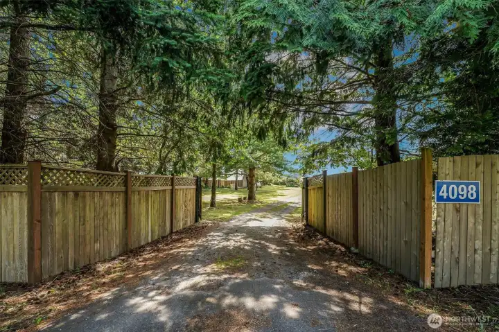 Gated entry to you 1+ acre oasis.