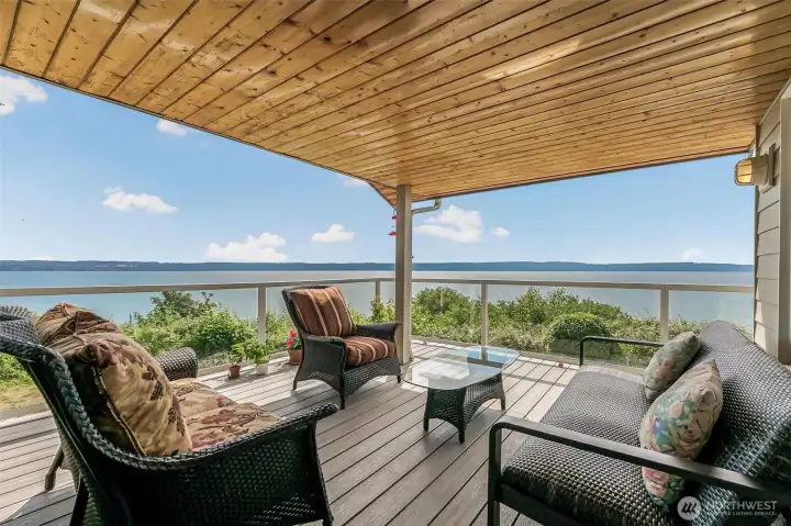 The deck is covered, allowing you to enjoy the view all year long.