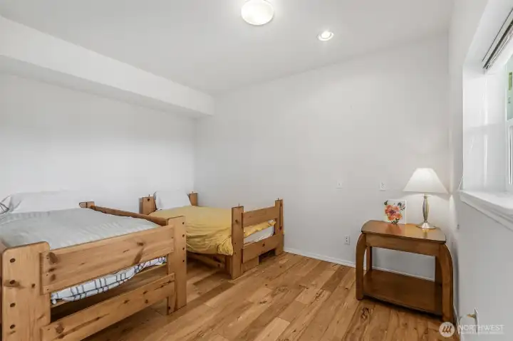 The third bedroom has extra space for more beds or for an office.