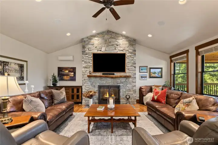 Living room provides access to covered back deck.