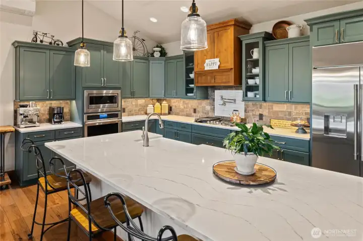 Huge island also serves as breakfast bar.