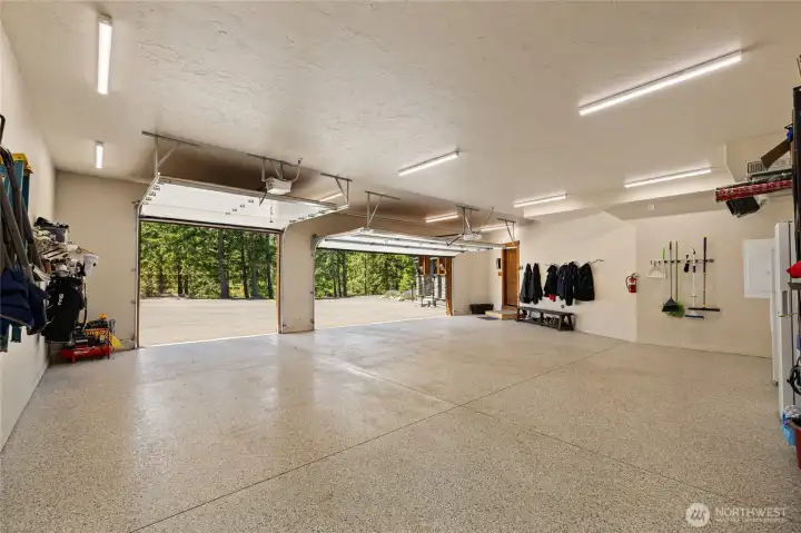 Attached 3 car garage is heated and fully finished with epoxy flooring.