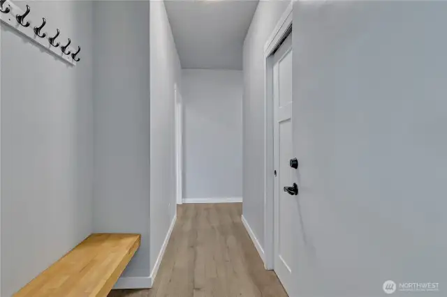 Garge Hall enrance with custom bench and coat rack.
