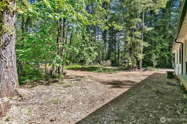 Home is situated on lot to maximize backyard area.