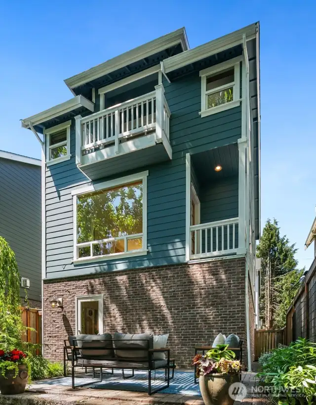 This stylish home offers a special opportunity for outdoor living - dining al fresco, reading your favorite book, pursuing your gardening interests - it's just the best!  And only blocks from the culturally rich Central District with its myriad of enticing shops, trendy restaurants and services for everyday living.