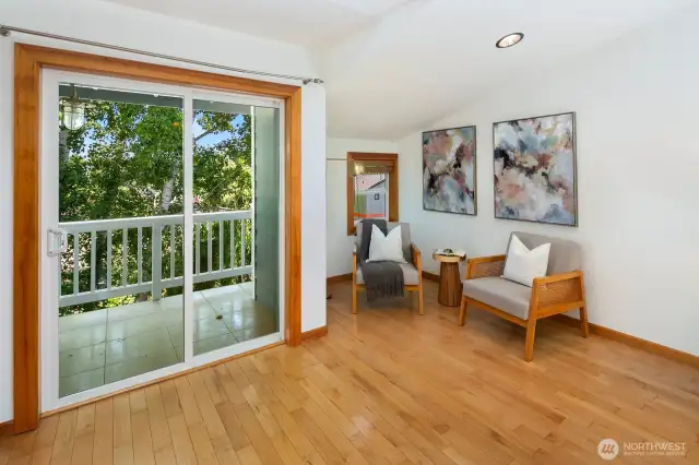 Top floor offers a stunning garden-facing primary suite with private balcony and cozy nook for reading.