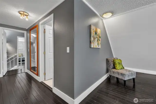 Primary is large with extra sitting space and a wall of closets