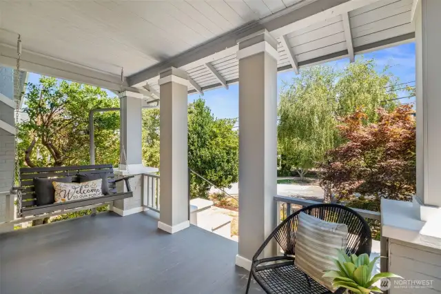 Enjoy your morning coffee on the front porch. This neighborhood is quiet, while still being close to all that Queen Anne has to offer