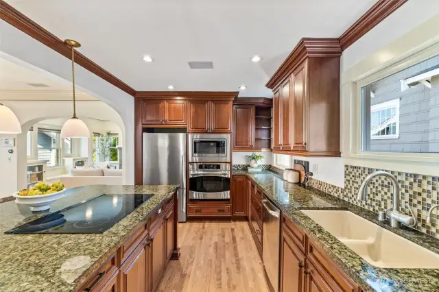 Plenty of storage and stainless steel appliances complete this beautiful kitchen
