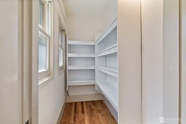 Storage room off the kitchen makes for a great panty. There is also water plumbed to the room, so potential to turn into a powder bathroom.