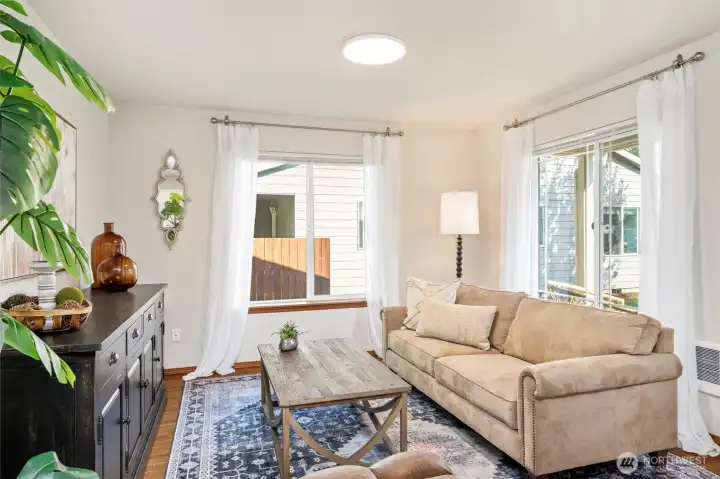 Living room filled with natural lots of light.