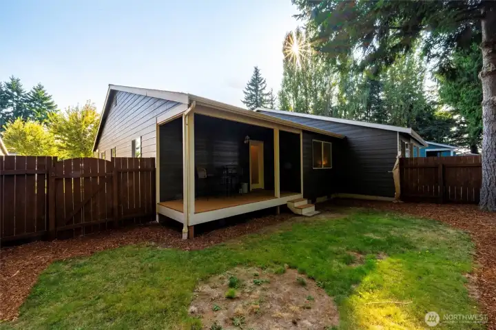 Fully fenced back yard with private deck.