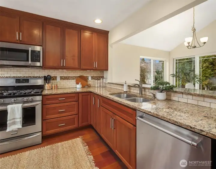 Remodeled kitchen with eating bar.