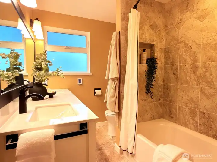 The main floor has a 5-piece bathroom and heated floors.