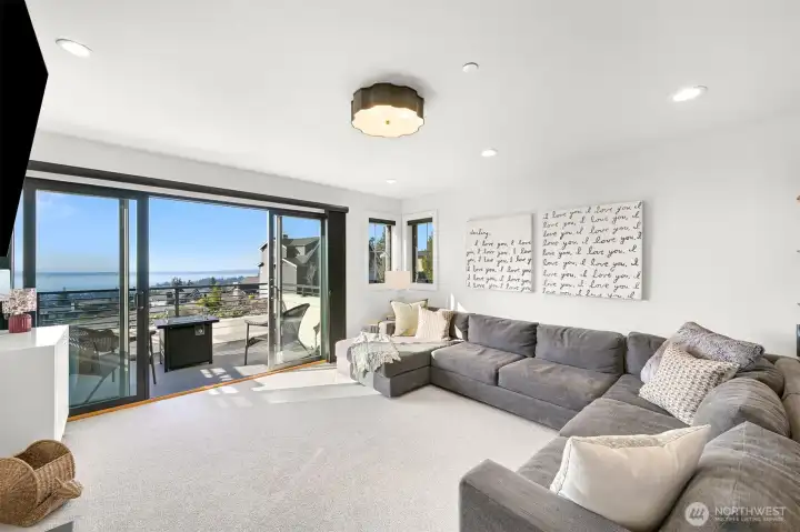 The media room also has a private walk out balcony.