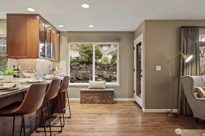 Enjoy views of the serene backyard landscaping while cooking, eating or entertaining.