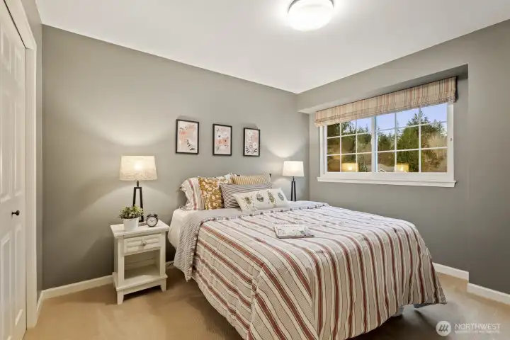 The third bedroom is a cozy retreat for the any member of the family, or visiting guests.
