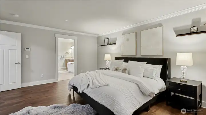 This beautiful primary suite offers comfort, space, and easy access to the ensuite bathroom.