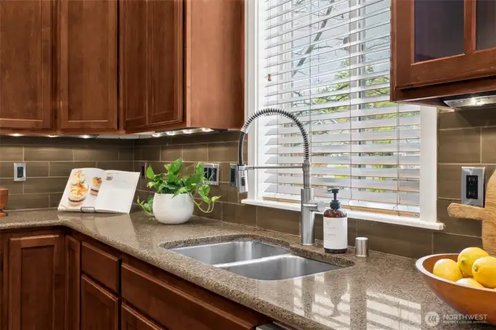 Gleaming granite countertops adorned with under cabinet lighting