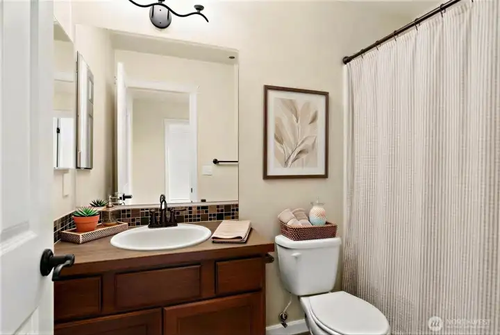 Another bathroom upstairs is perfectly located