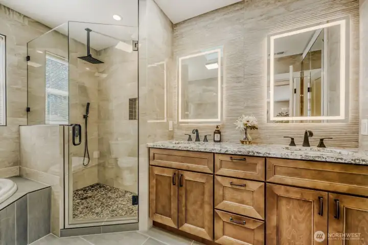 Your primary bathroom walk-in shower and soaking tub