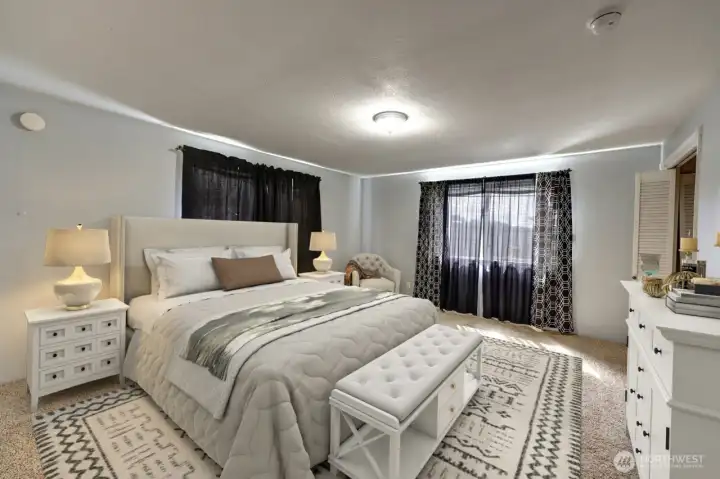 Virtually staged, primary bedroom.
