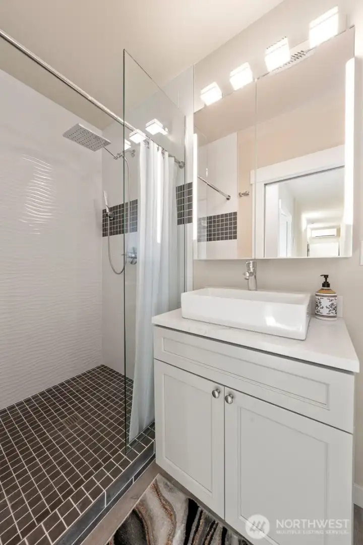 lower level bathroom with walk in shower