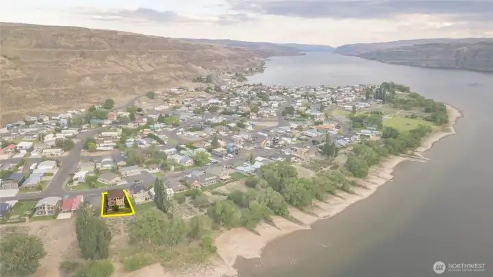 Aerial of the beach in front of the house.