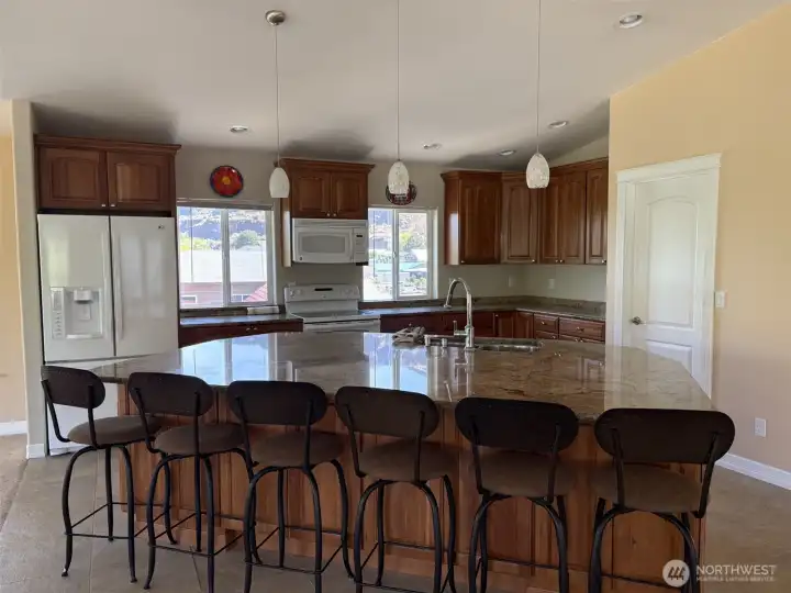 View of the kitchen and large island