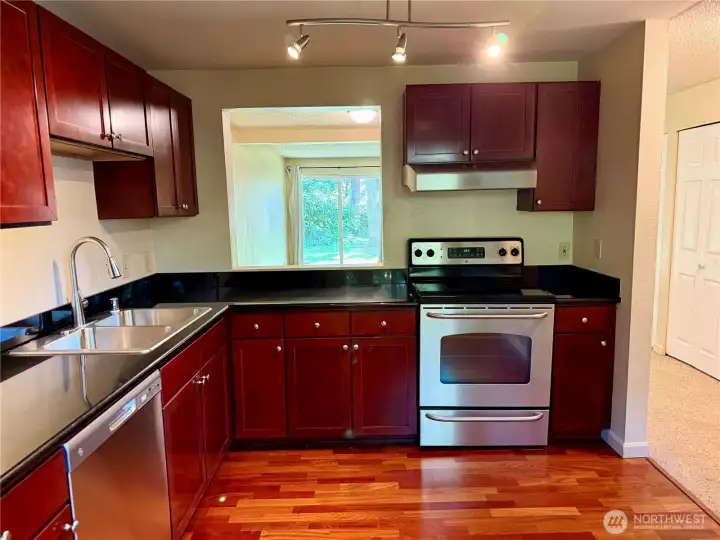 Updated Kitchen with stainless steel appliances & granite counters.