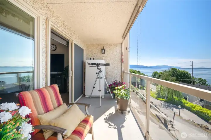 Slider brings you on to the balcony.  Space for outdoor refrigerator shown here.