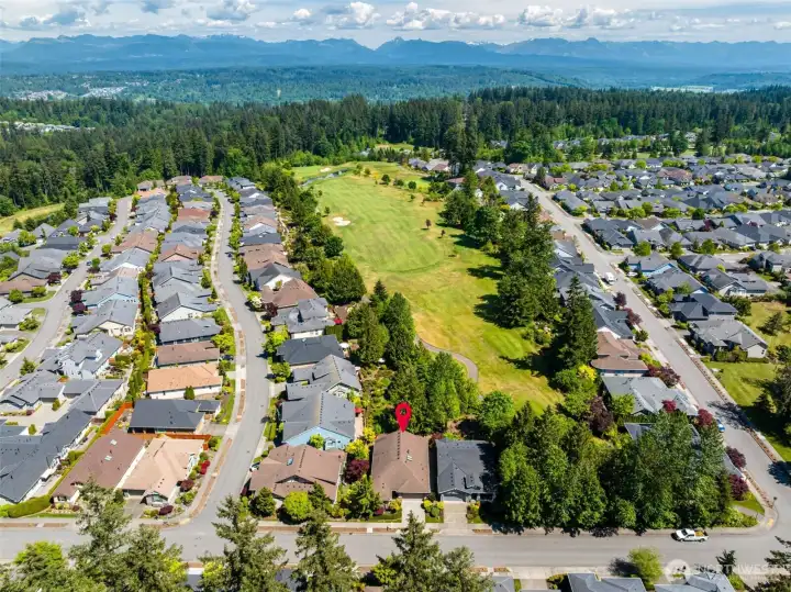 Set back from the golf course...no fear of golf balls landing in your yard...just the peaceful serenity and privacy of the perfect location.