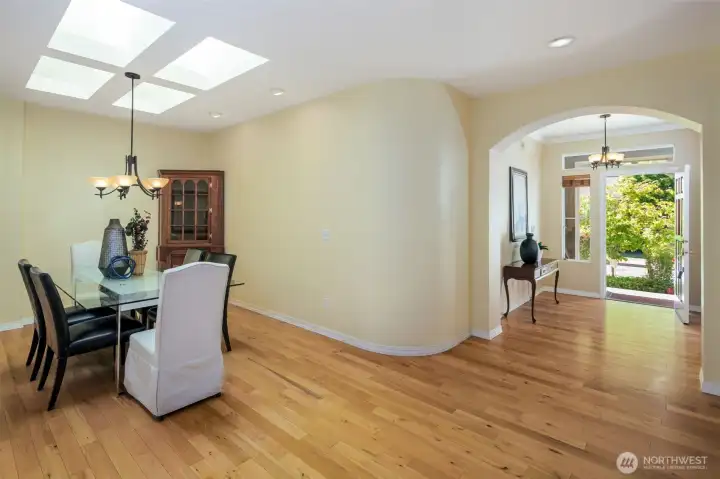 Full sized dining room off the entry with skylight.