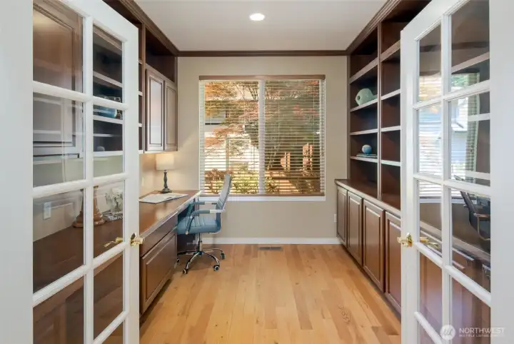 Full sized office with double door entry.