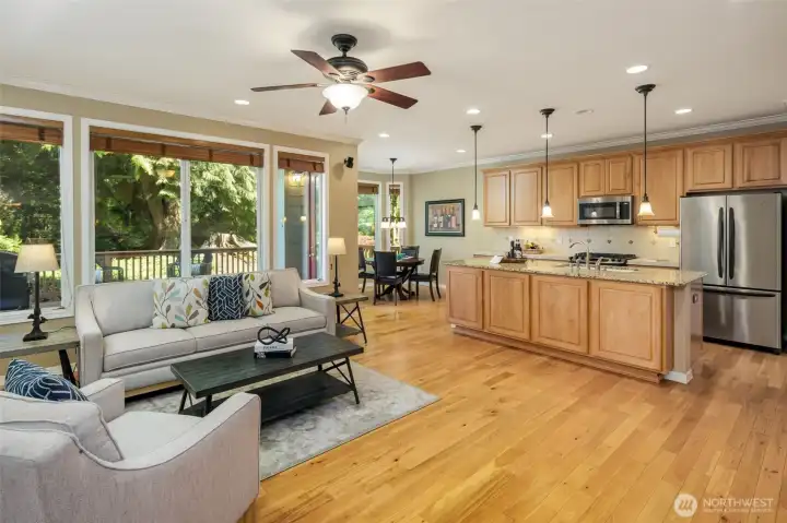 Great room...is GREAT with walls of windows looking out to the deck and golf course.