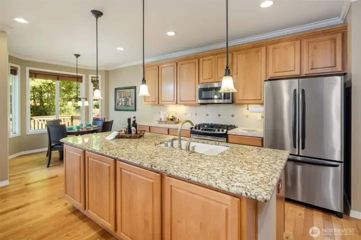 View of the island kitchen and breakfast nook.