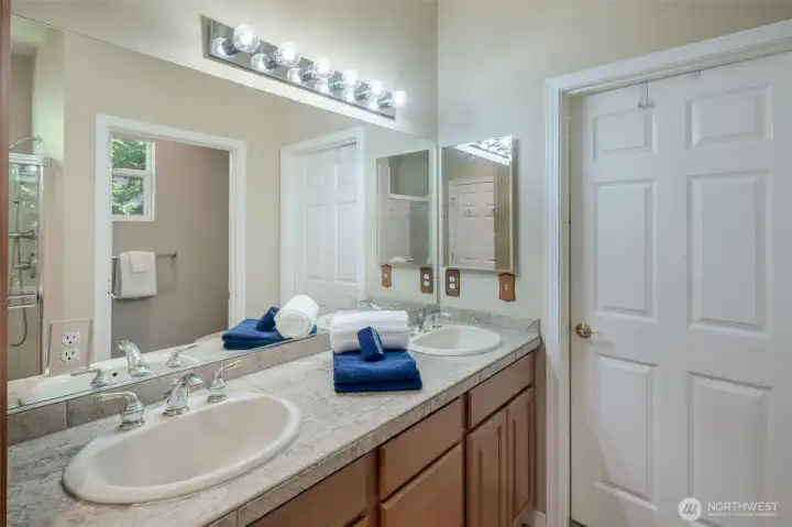 Dual vanity in the primary bathroom.