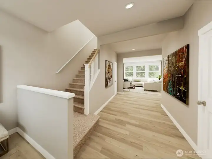 Defined entry with access to garage, front door and upstairs. Photo rendering is representational and may be virtually staged. Actual home is under construction and finishes, elevation, and paint colors may vary. See site agent for details.
