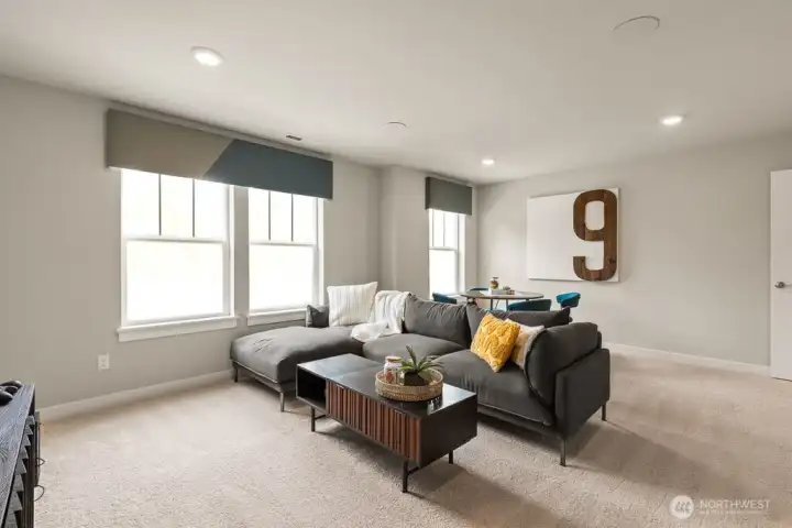 Bonus room. Photo rendering is representational and may be virtually staged. Actual home is under construction and finishes, elevation, and paint colors may vary. See site agent for details.