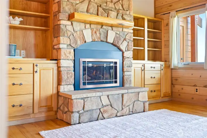 Thoughtfully designed bookcase on either side of the fireplace