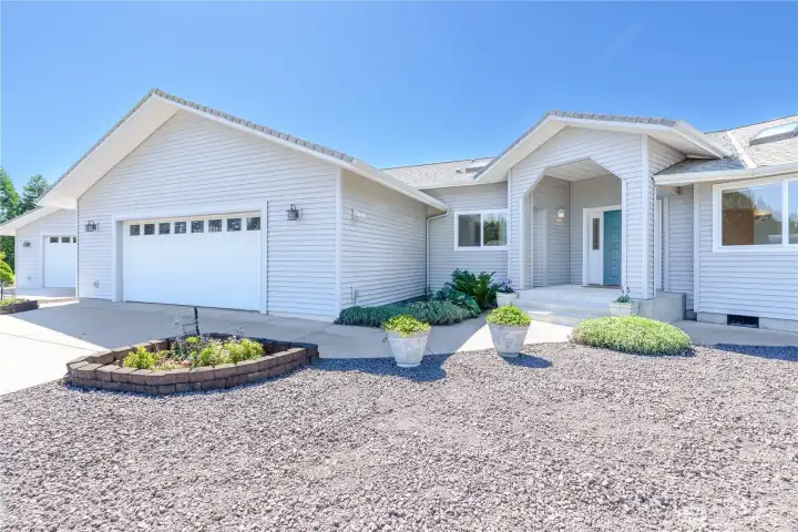 Attached 2 car garage with built in shelving. Attached 2 car garage with built in shelving.