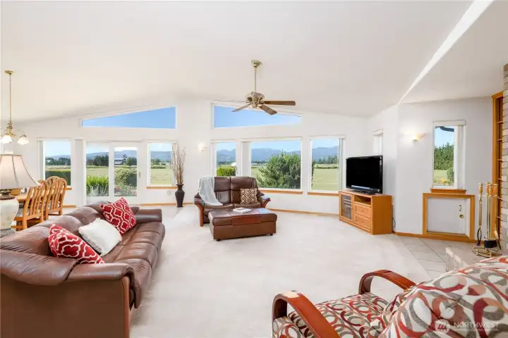 Living room with specialty lighting and convenient floor plugs. Living room with specialty lighting and convenient floor plugs.