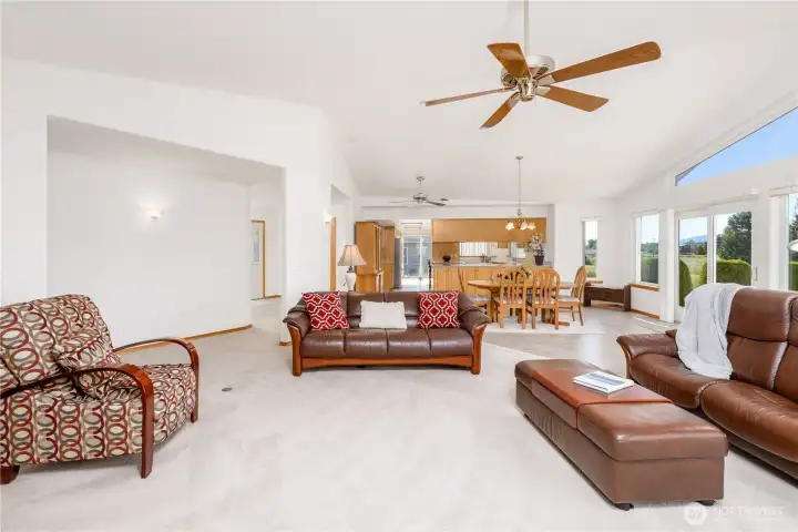 Open concept living, dining and kitchen areas. Open concept living, dining and kitchen areas.