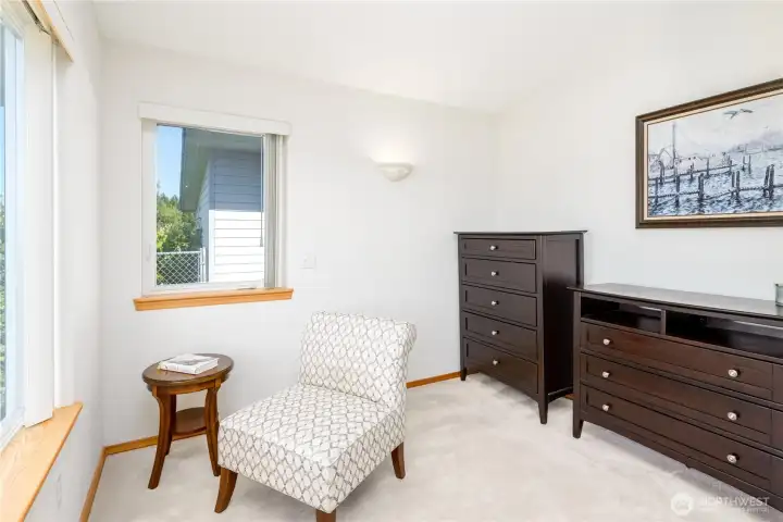 Primary bedroom with sitting area. Primary bedroom with sitting area.