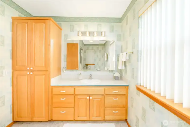 Primary bath with extra storage with pull outs. Primary bath with extra storage with pull outs.