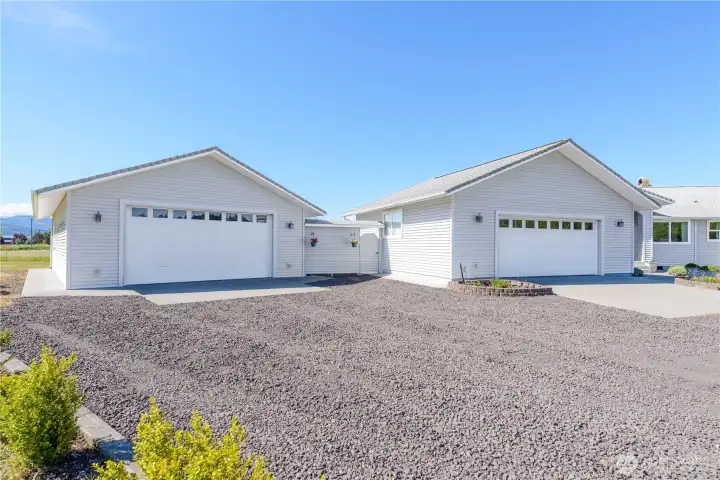 Over 1700 sq ft of combined garage/shop space. Over 1700 sq ft of combined garage/shop space.